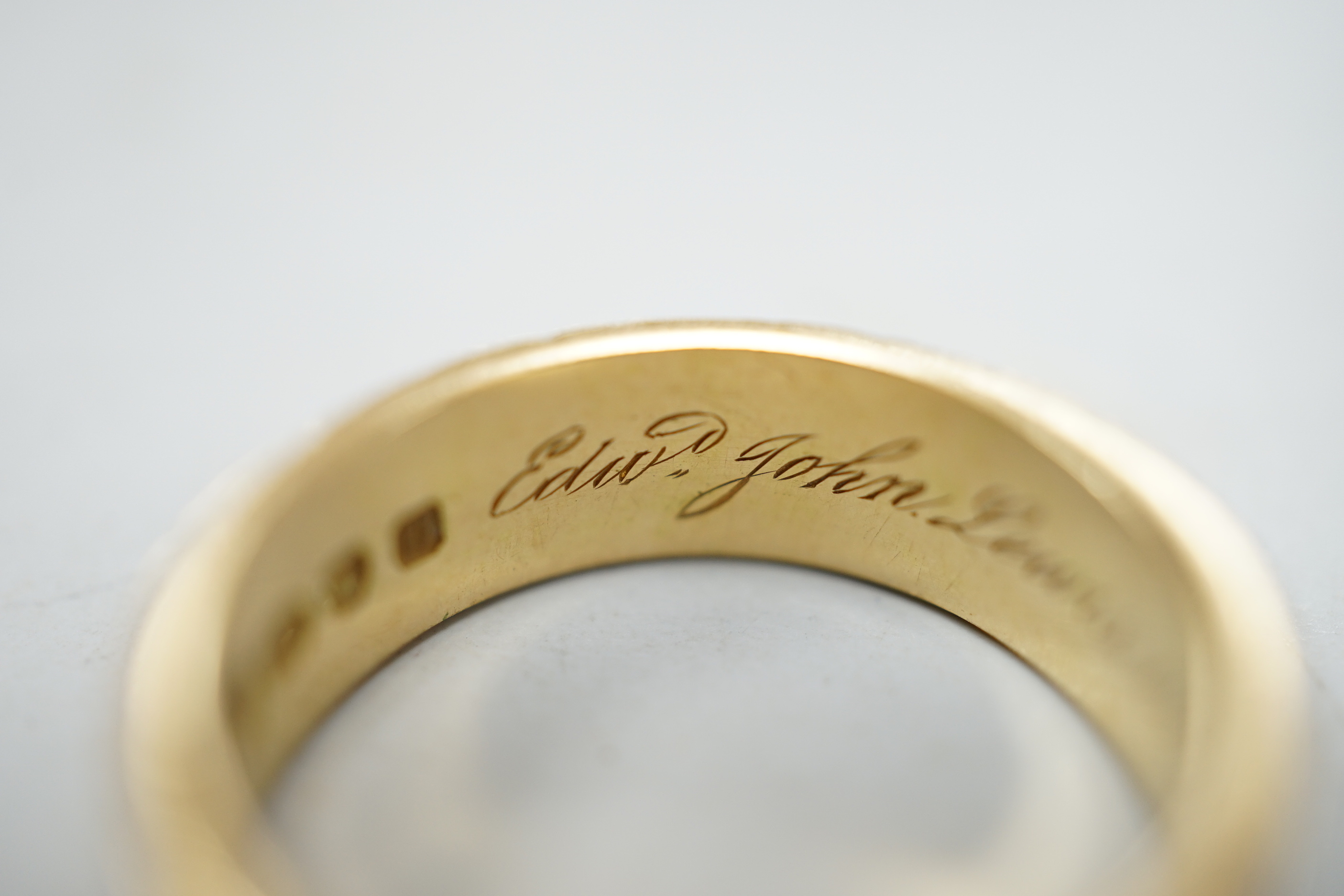 A Victorian 18ct gold and black enamel 'In Memoriam' band, inscribed ' Edwr John Lewis obt 5th April 1876, at 54', size N, gross weight 4 grams.